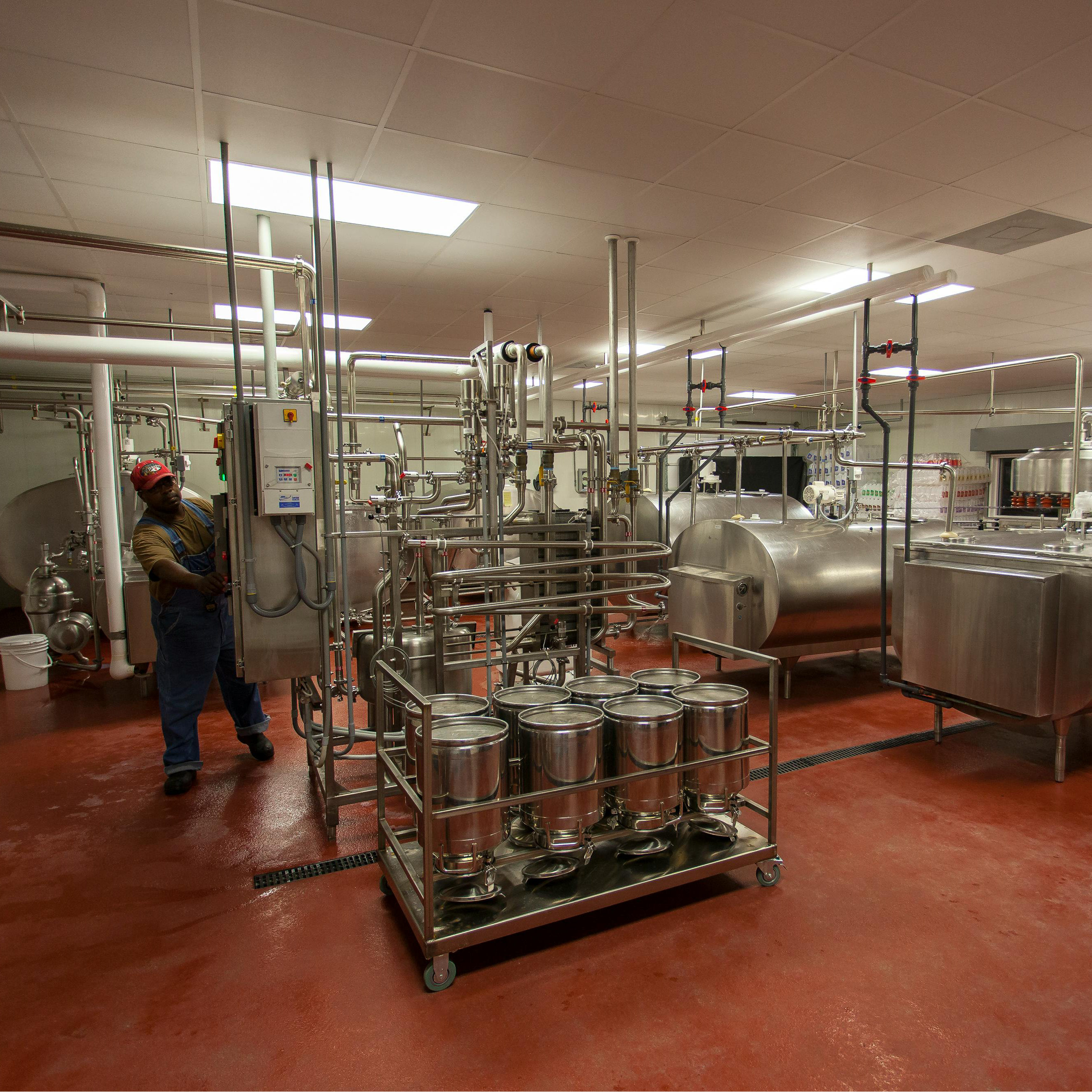 worker at food processing facility - infrastructure insurance premiums
